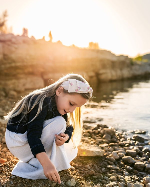 Littlegirlcollectingrocks